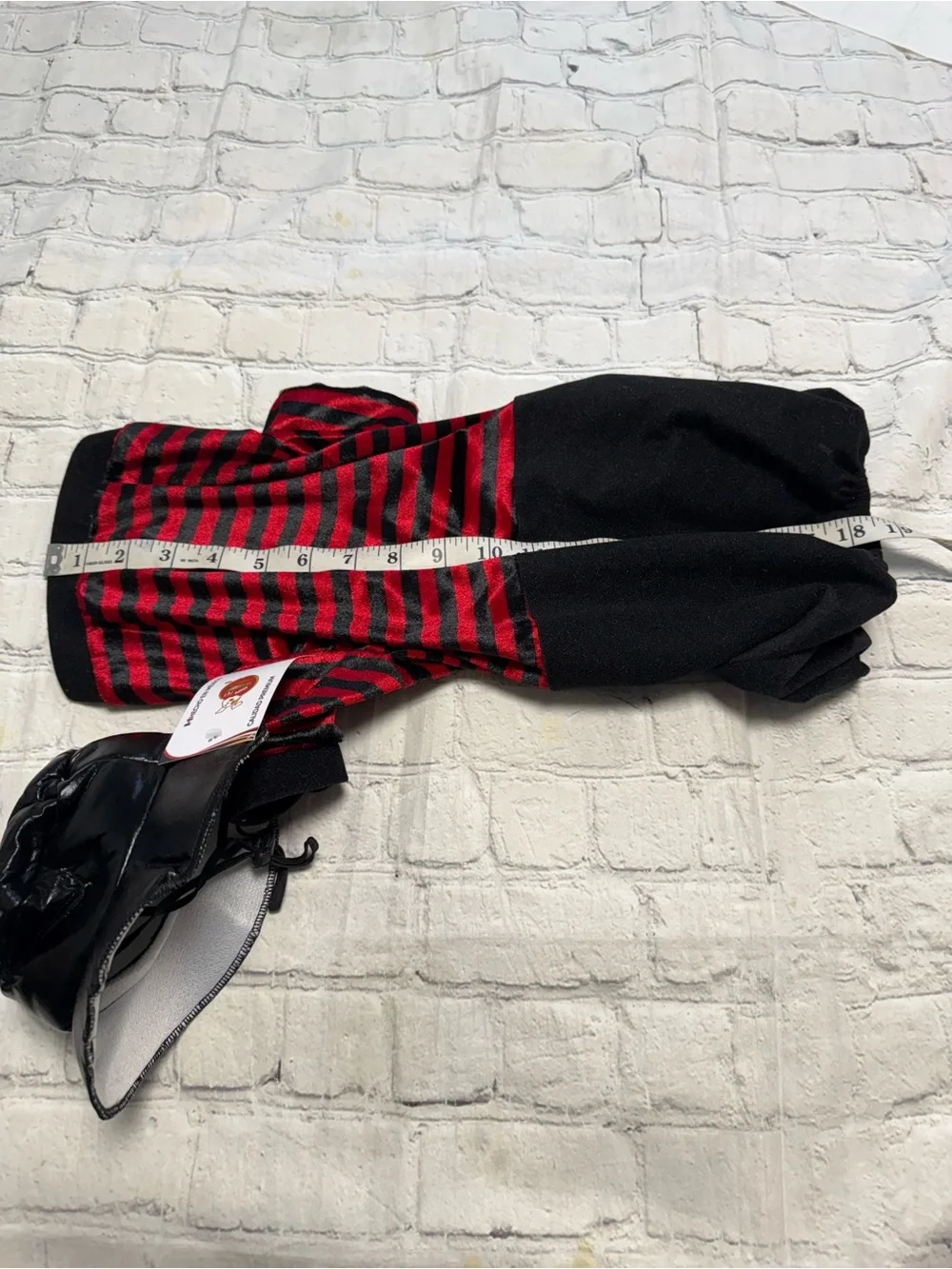Pet Warrior Dog striped shirt with black pants custome. Halloween costume.